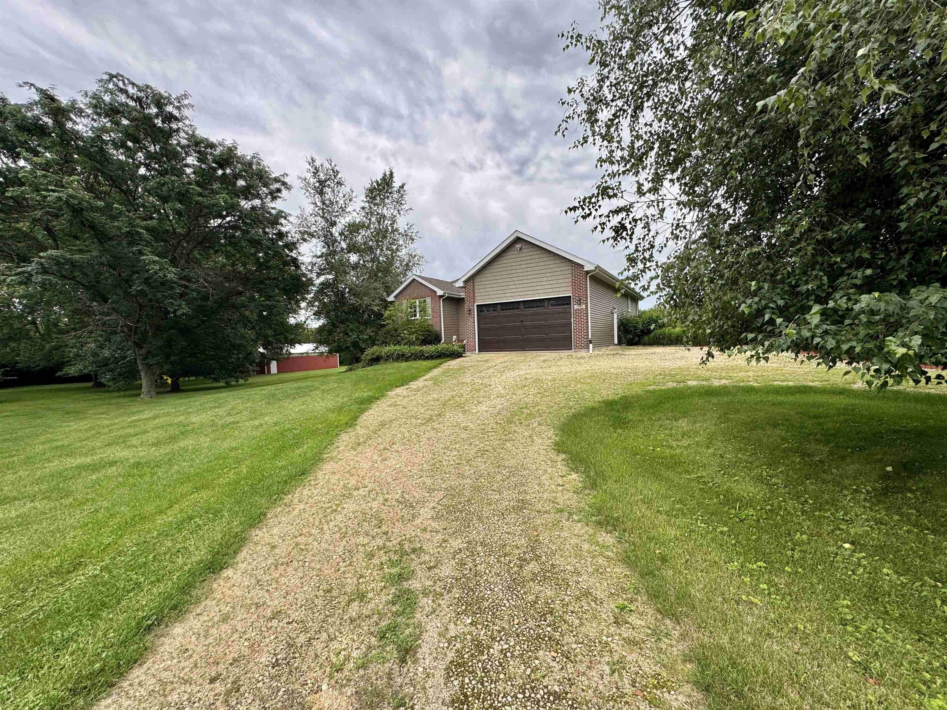 7188 Edwardsville Road Rockford, IL 61102 - Photo 4 of 73 a view of a house with a yard