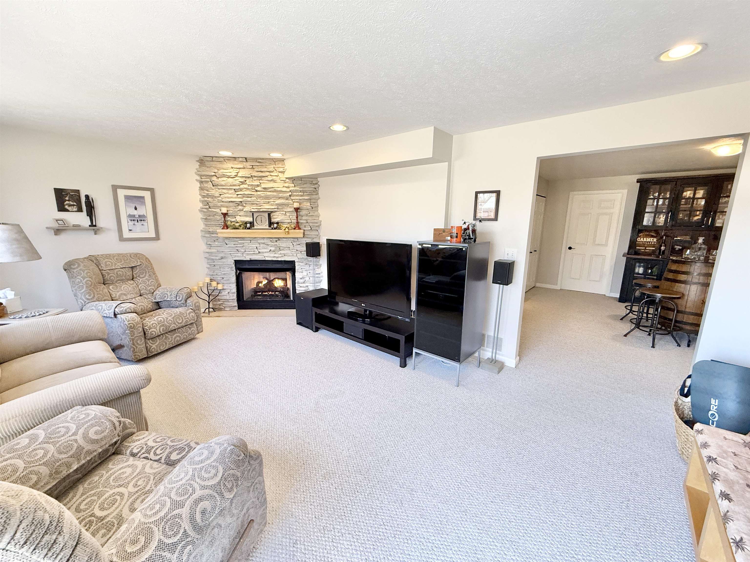 7188 Edwardsville Road Rockford, IL 61102 - Photo 41 of 73 a living room with furniture and a flat screen tv