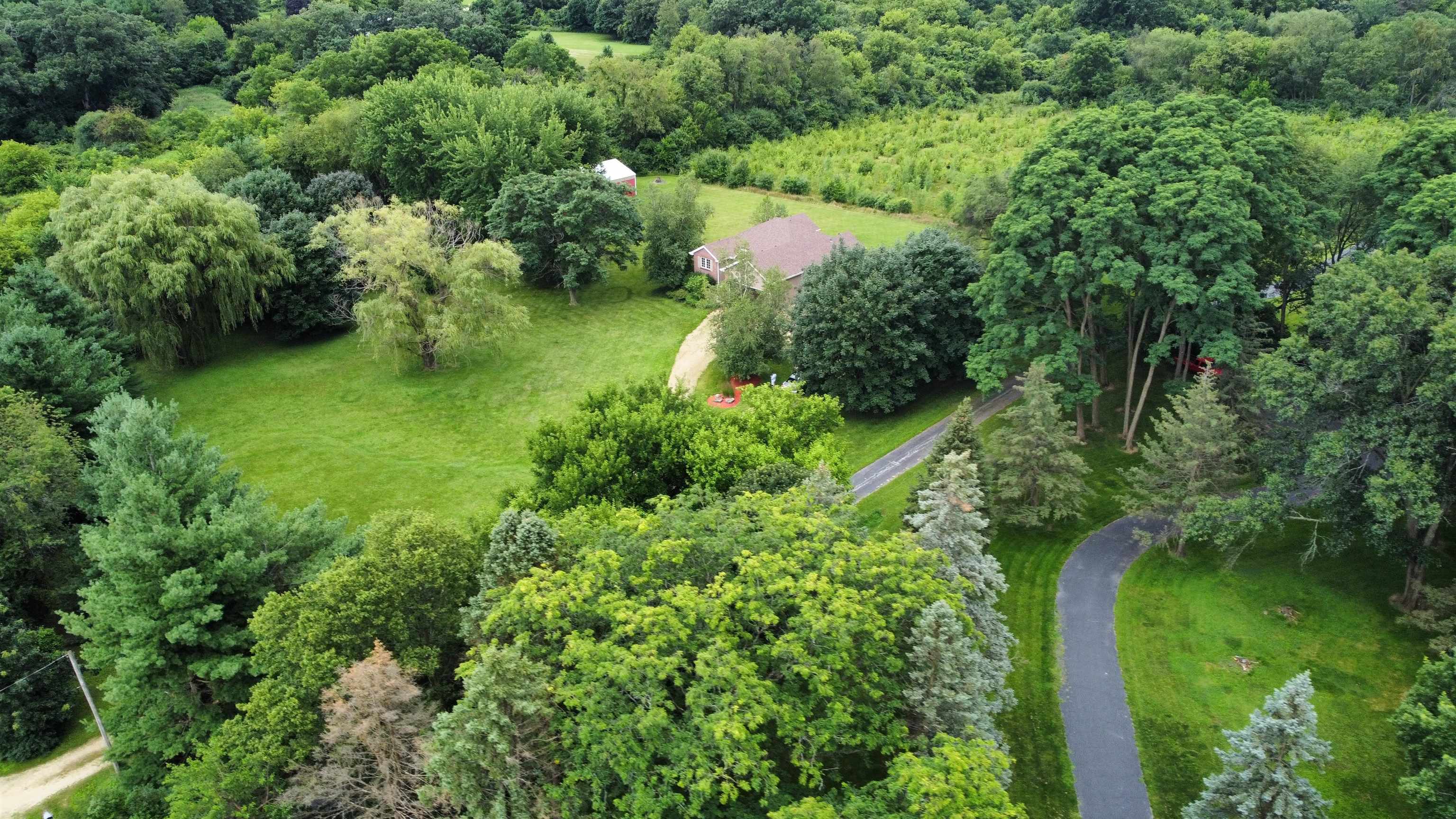 7188 Edwardsville Road Rockford, IL 61102 - Photo 58 of 73 an aerial view of residential house with outdoor space and trees all around