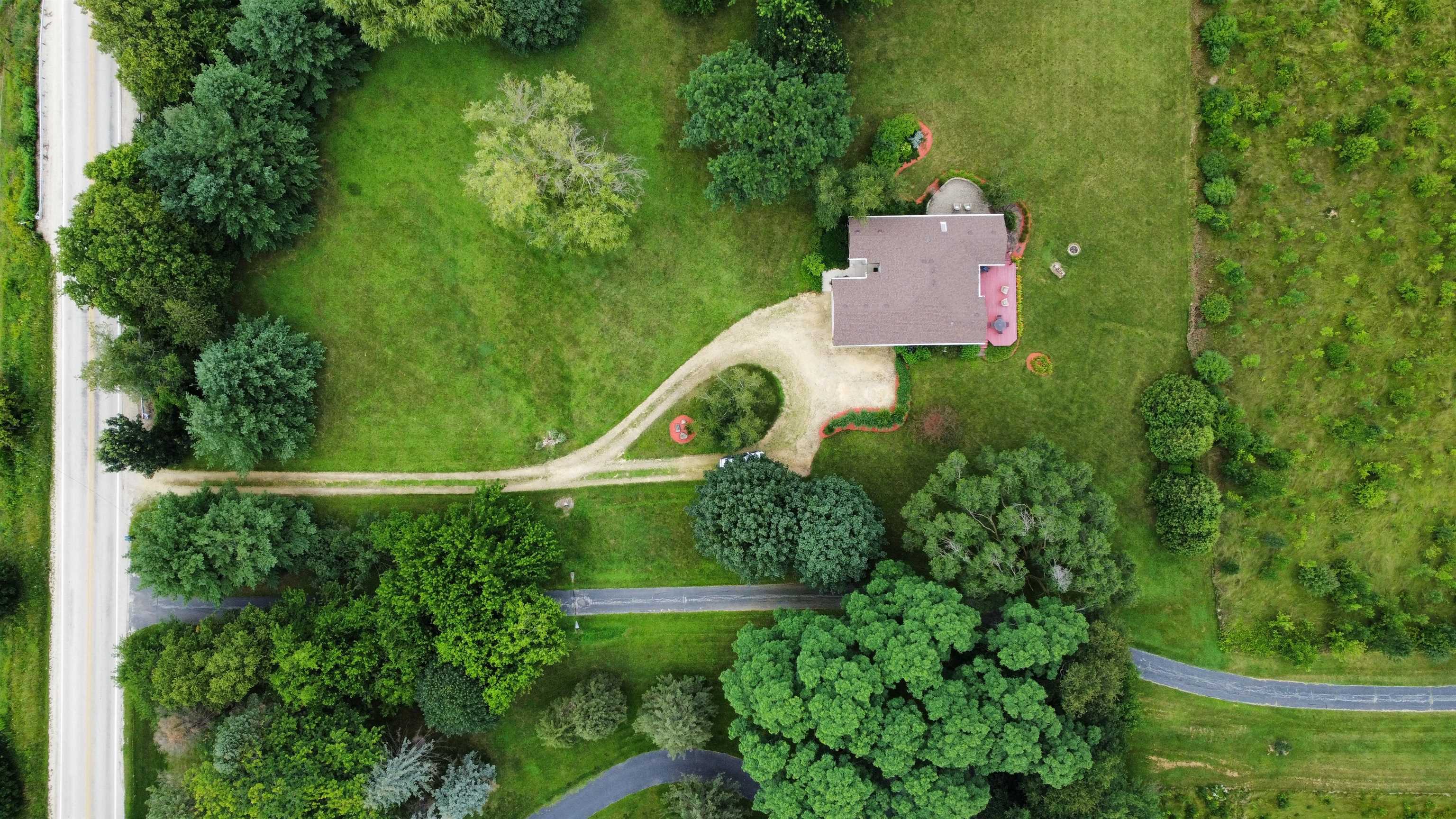 7188 Edwardsville Road Rockford, IL 61102 - Photo 59 of 73 an aerial view of a house with a yard and lake view