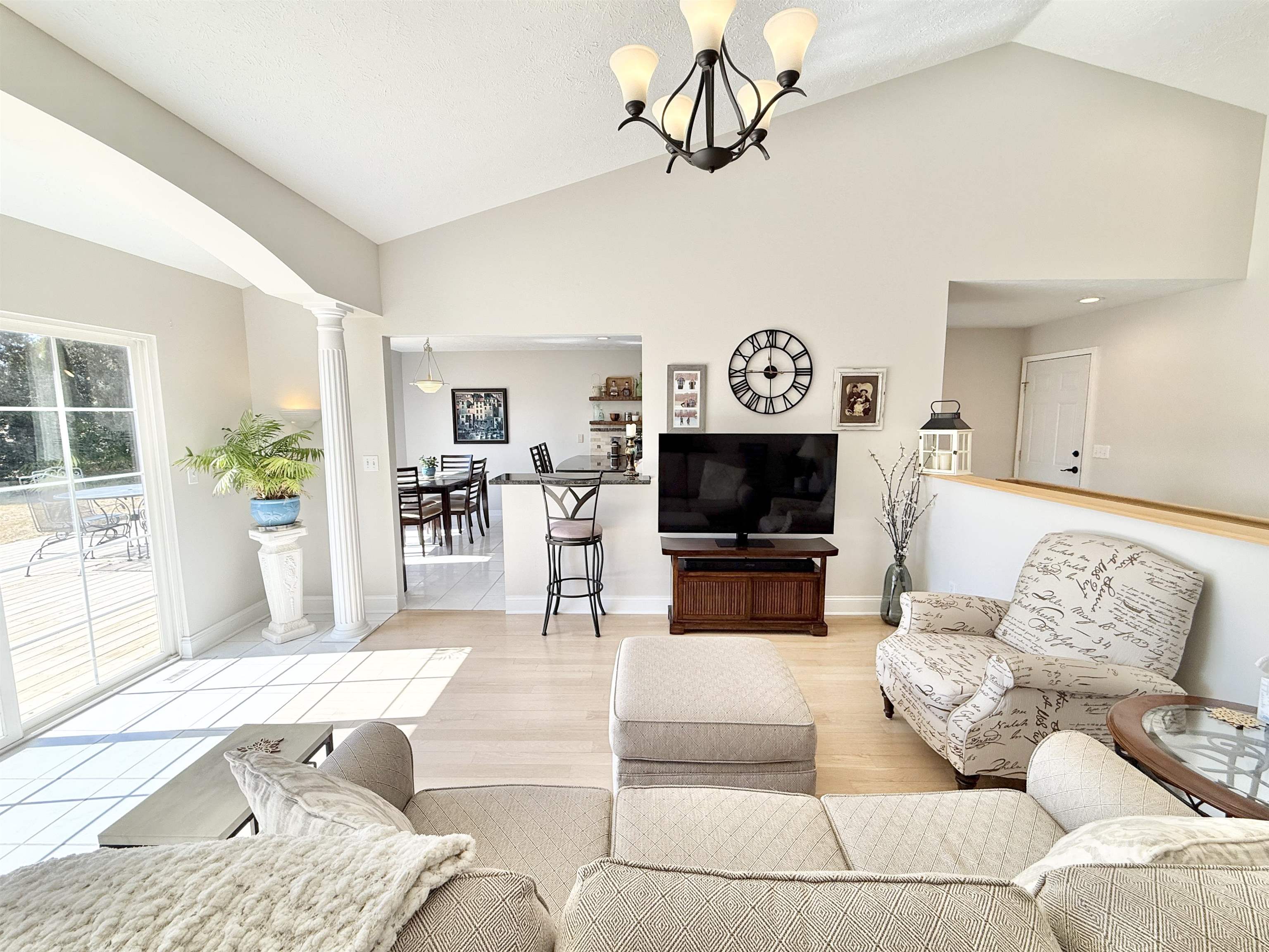 7188 Edwardsville Road Rockford, IL 61102 - Photo 10 of 73 a living room with furniture and a flat screen tv