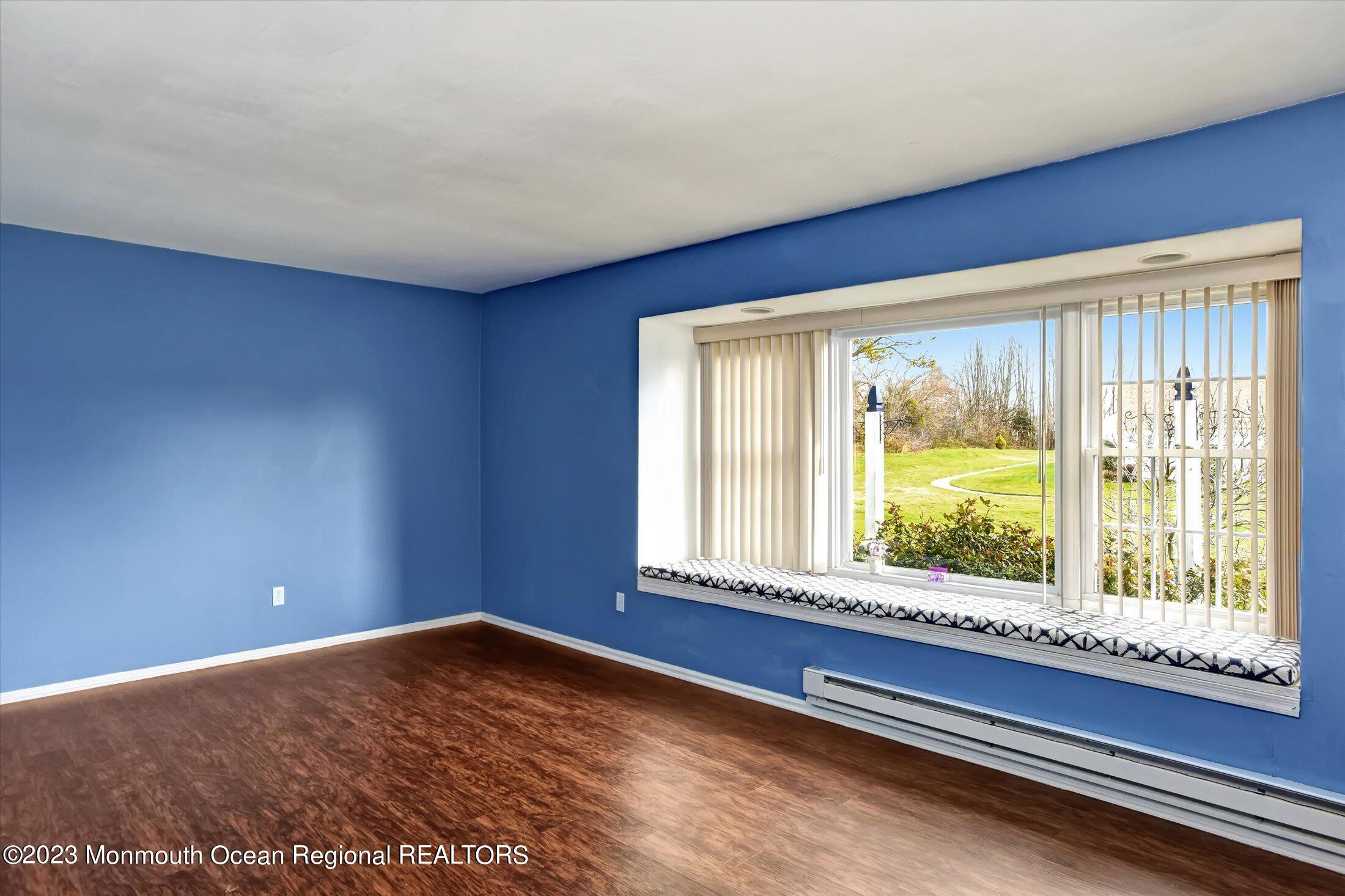 35 B Zacatin Road Freehold, NJ 07728 - Photo 13 of 35 a view of an empty room with a window