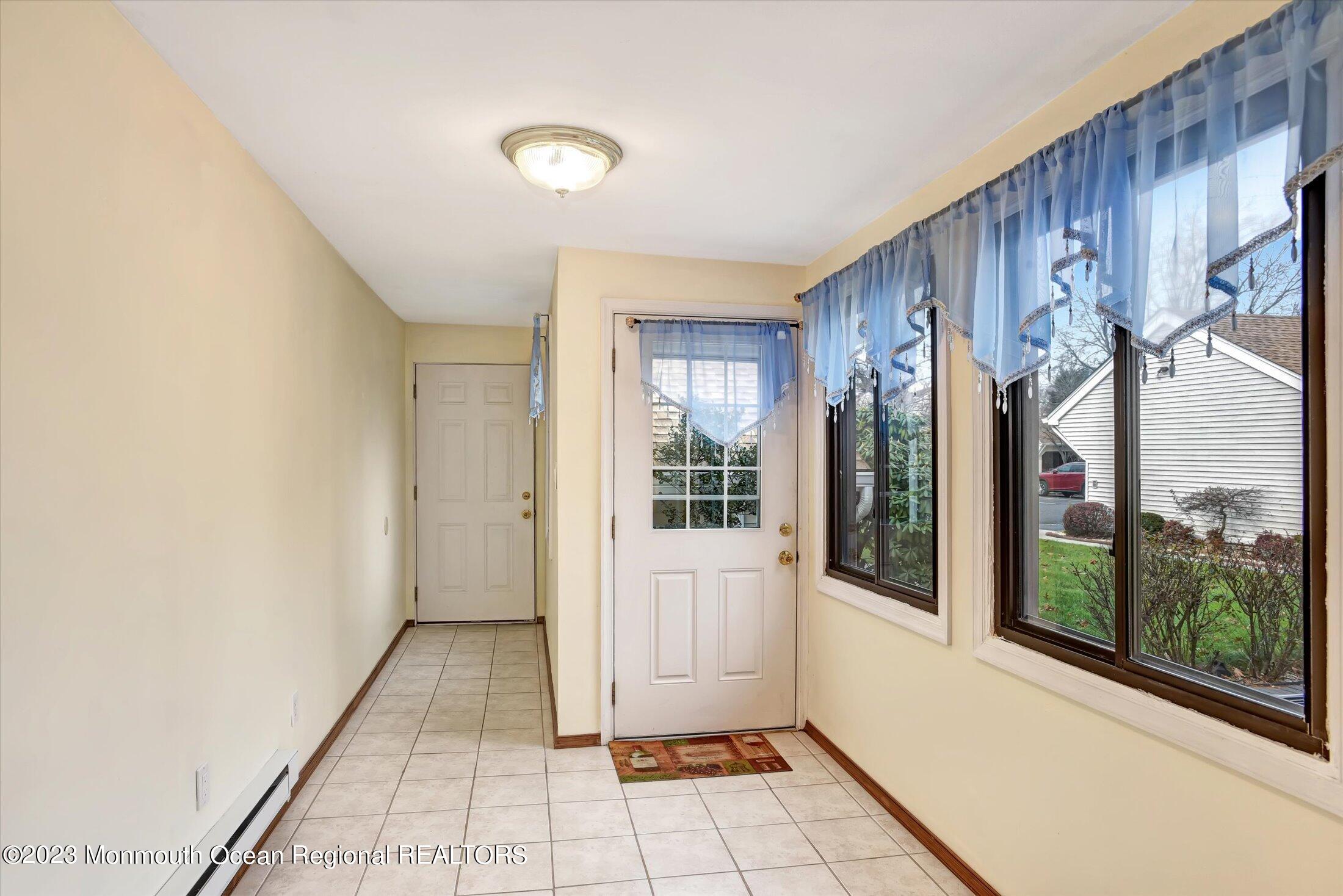 35 B Zacatin Road Freehold, NJ 07728 - Photo 3 of 35 a view of a entryway with interior of house