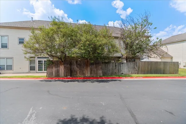 a view of a swimming pool with an outdoor space and seating area