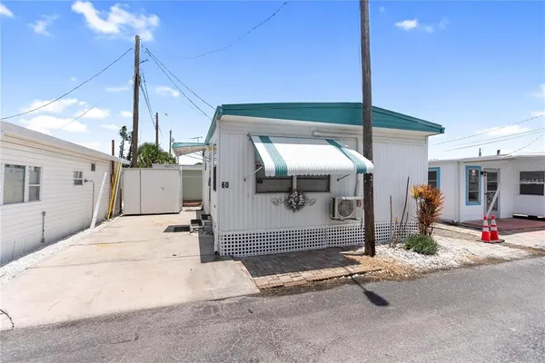 a front view of a house with garage