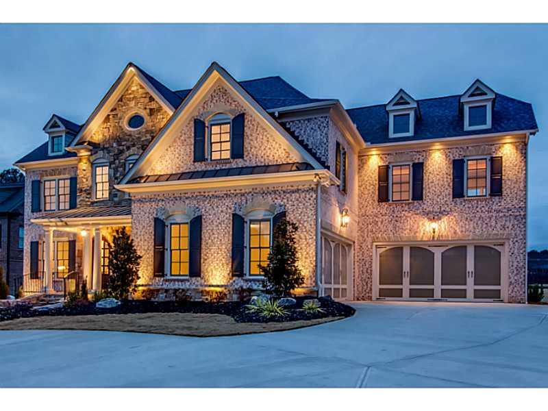 Exterior Front. This home is the last of 2 home Greystone Manor. An enclave of 59 homes. Beautiful night lighting makes this home a show stopper!