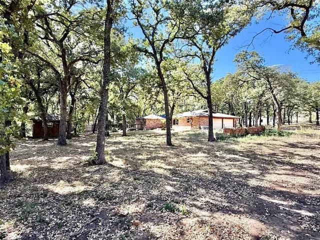 a view of road with trees