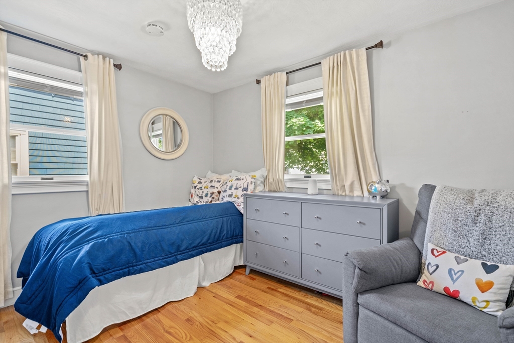 7 Leonard Circle Medford, MA 02155 - Photo 17 of 33 a bedroom with a bed and a window