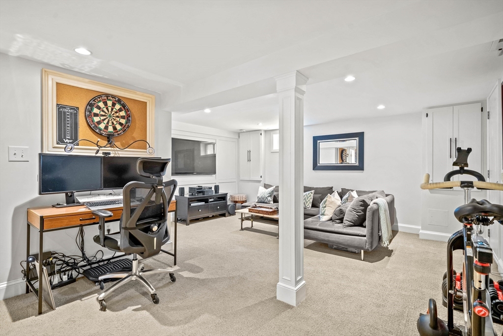 7 Leonard Circle Medford, MA 02155 - Photo 20 of 33 a view of a livingroom with workspace and a couch
