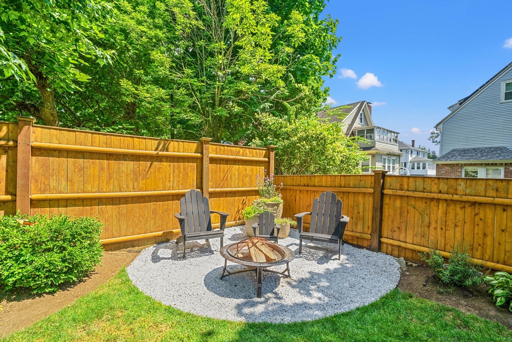 7 Leonard Circle Medford, MA 02155 - Photo 26 of 33 a view of a chairs and table in the patio