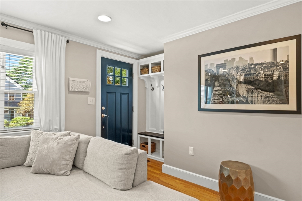 7 Leonard Circle Medford, MA 02155 - Photo 3 of 33 a living room with furniture and a window