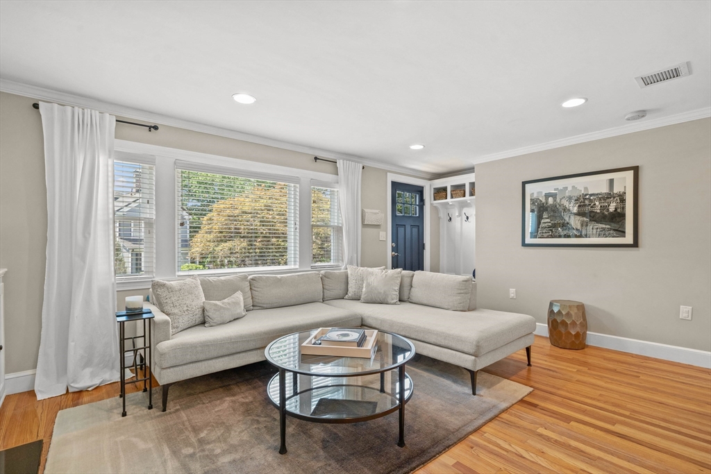 7 Leonard Circle Medford, MA 02155 - Photo 4 of 33 a living room with furniture and a large window