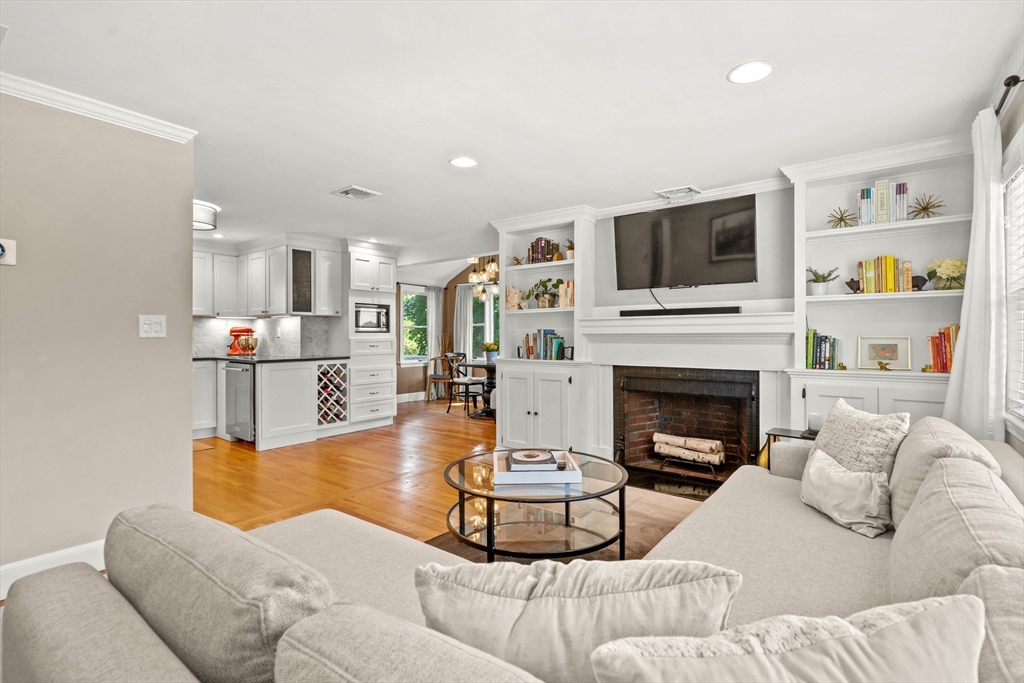 7 Leonard Circle Medford, MA 02155 - Photo 7 of 33 a living room with furniture and a fireplace