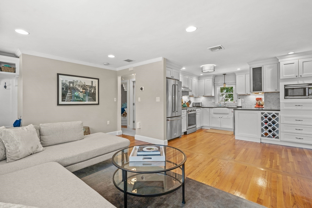 7 Leonard Circle Medford, MA 02155 - Photo 8 of 33 a living room with stainless steel appliances furniture and kitchen view