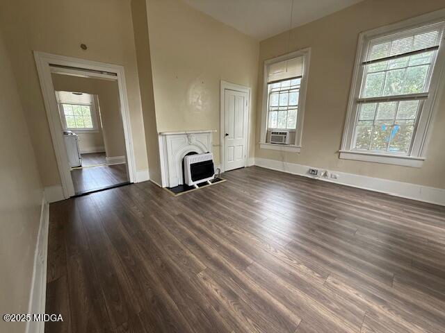 955 Cole Street, Unit 4 Macon, GA 31201 - Photo 2 of 7 a view of empty room with a fireplace and wooden floor