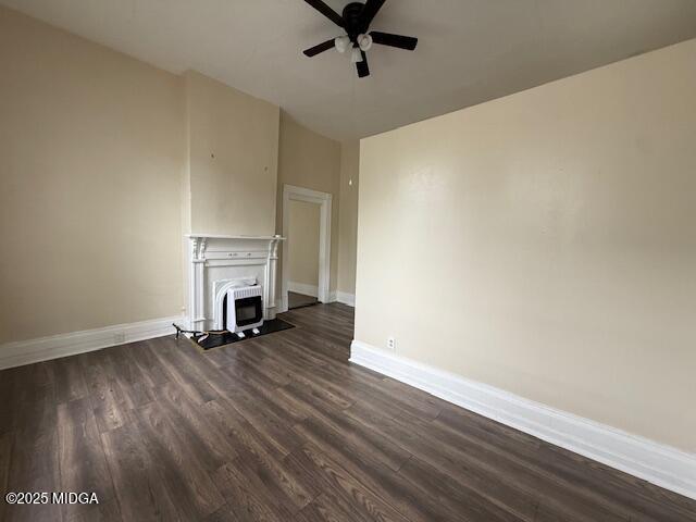 955 Cole Street, Unit 4 Macon, GA 31201 - Photo 6 of 7 an empty room with wooden floor fireplace and windows