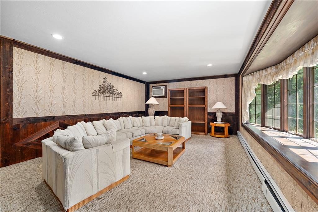 114 Pine Manor Sewickley, PA 15143 - Photo 12 of 40 a living room with furniture and a large window