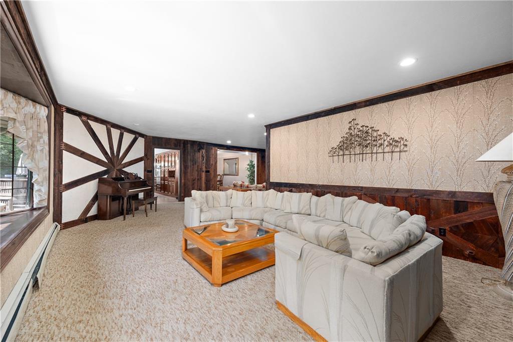 114 Pine Manor Sewickley, PA 15143 - Photo 13 of 40 a living room with furniture and a large window