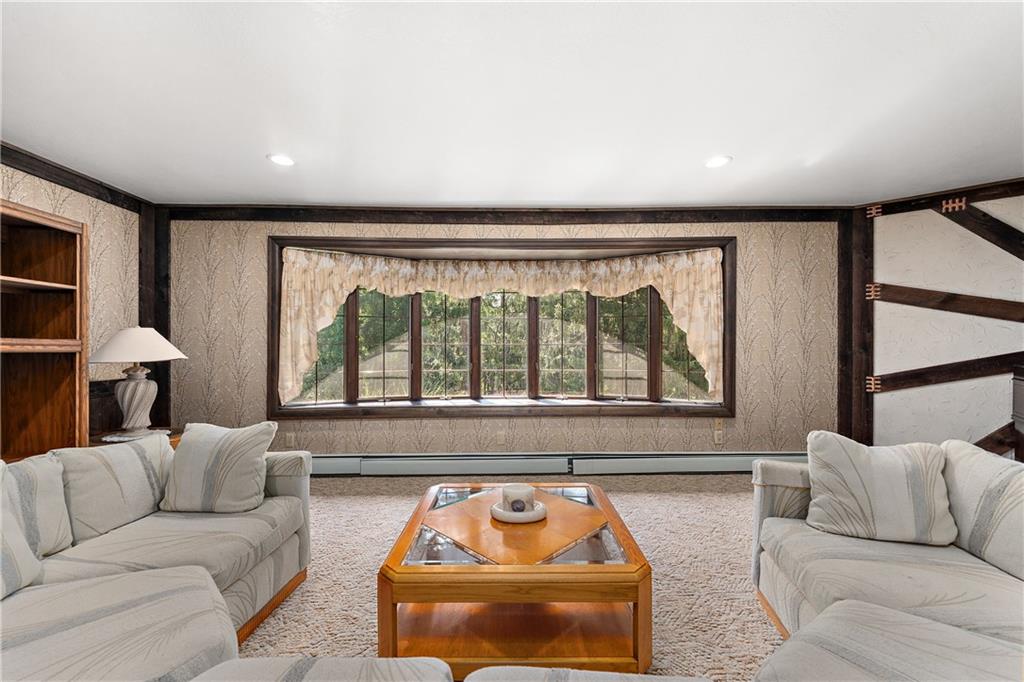 114 Pine Manor Sewickley, PA 15143 - Photo 14 of 40 a living room with furniture and a large window