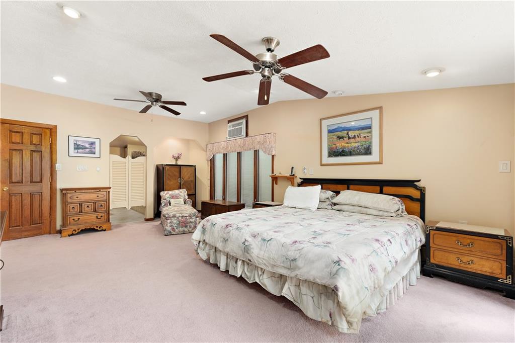 114 Pine Manor Sewickley, PA 15143 - Photo 20 of 40 a bed room with a bed and a ceiling fan