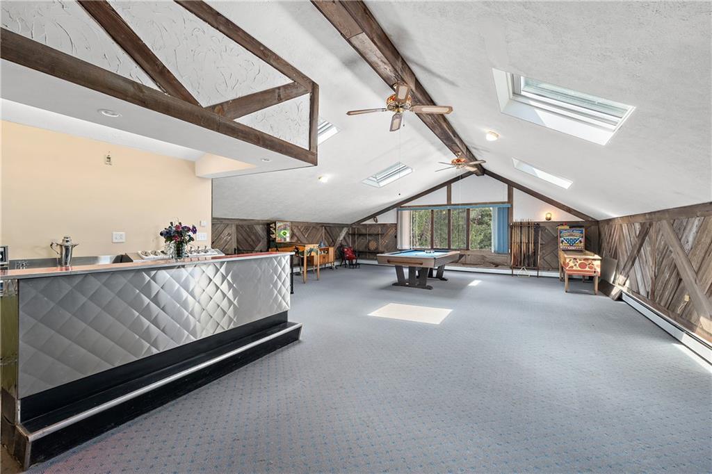 114 Pine Manor Sewickley, PA 15143 - Photo 28 of 40 a living room with furniture and a chandelier