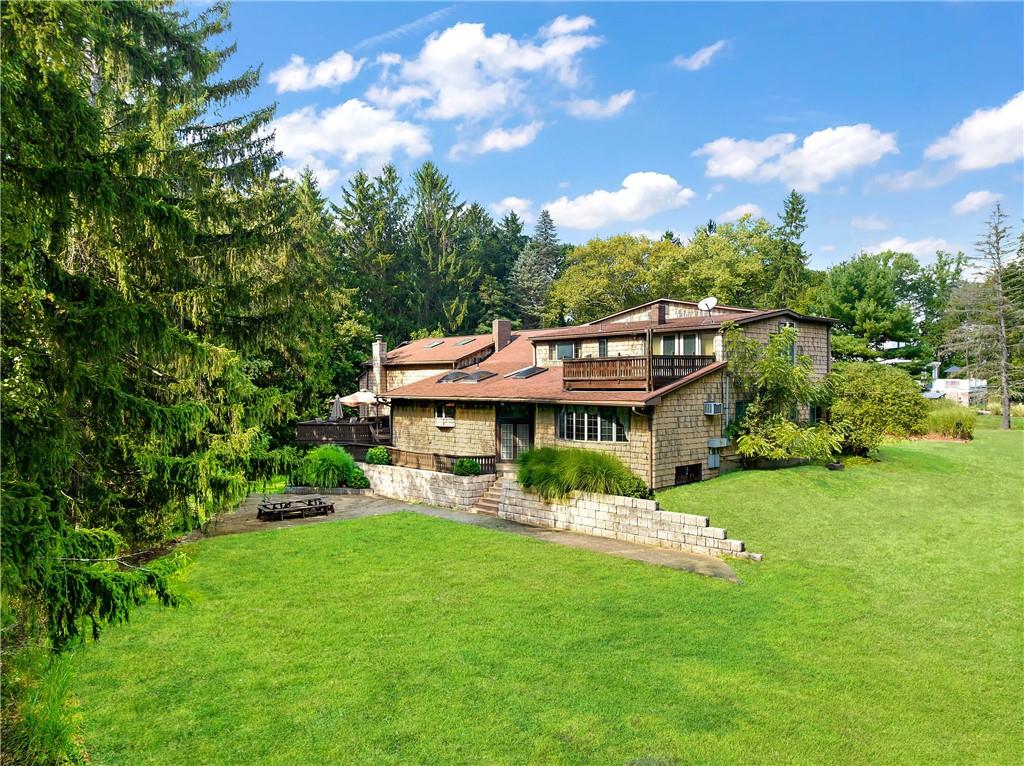 114 Pine Manor Sewickley, PA 15143 - Photo 36 of 40 a view of a house with a big yard