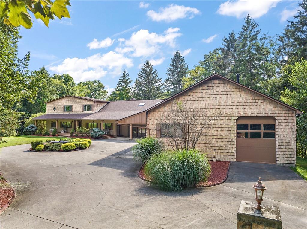 114 Pine Manor Sewickley, PA 15143 - Photo 39 of 40 a view of a house with a yard