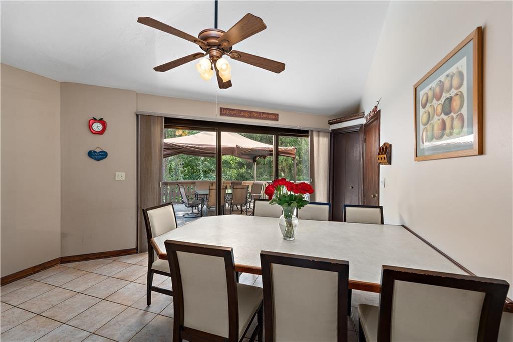 114 Pine Manor Sewickley, PA 15143 - Photo 7 of 40 a view of a dining room with furniture window and outside view