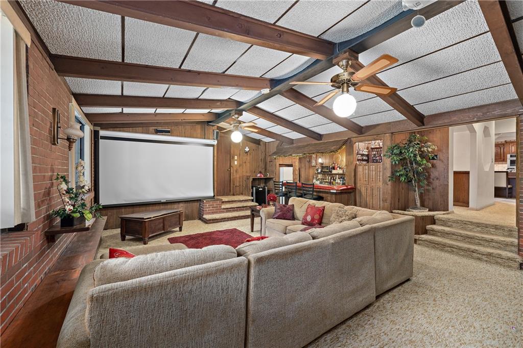 114 Pine Manor Sewickley, PA 15143 - Photo 8 of 40 a living room with furniture and a flat screen tv
