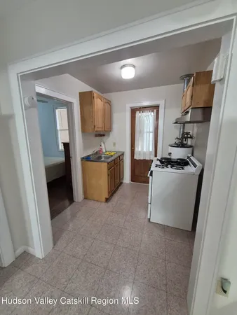 a room with furniture and a large window