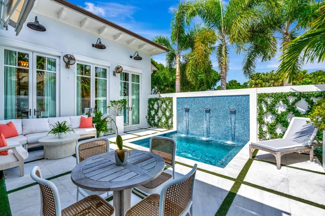 a view of an outdoor sitting area with furniture