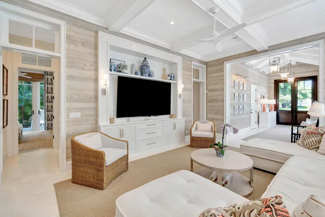 a view of a dining room with furniture wooden floor and flat screen tv