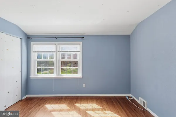a bathroom with a shower and a bath tub