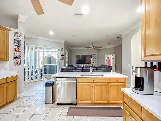 a kitchen with a stove and a refrigerator