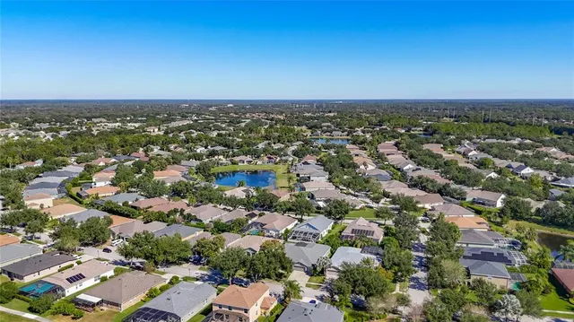 an aerial view of a city with lots of residential buildings