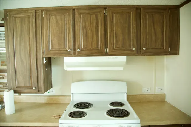 a bathroom with a sink and a window