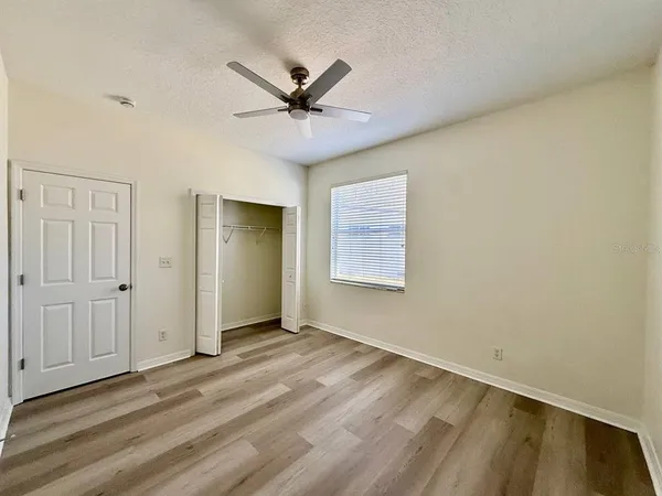 a view of an empty room and window