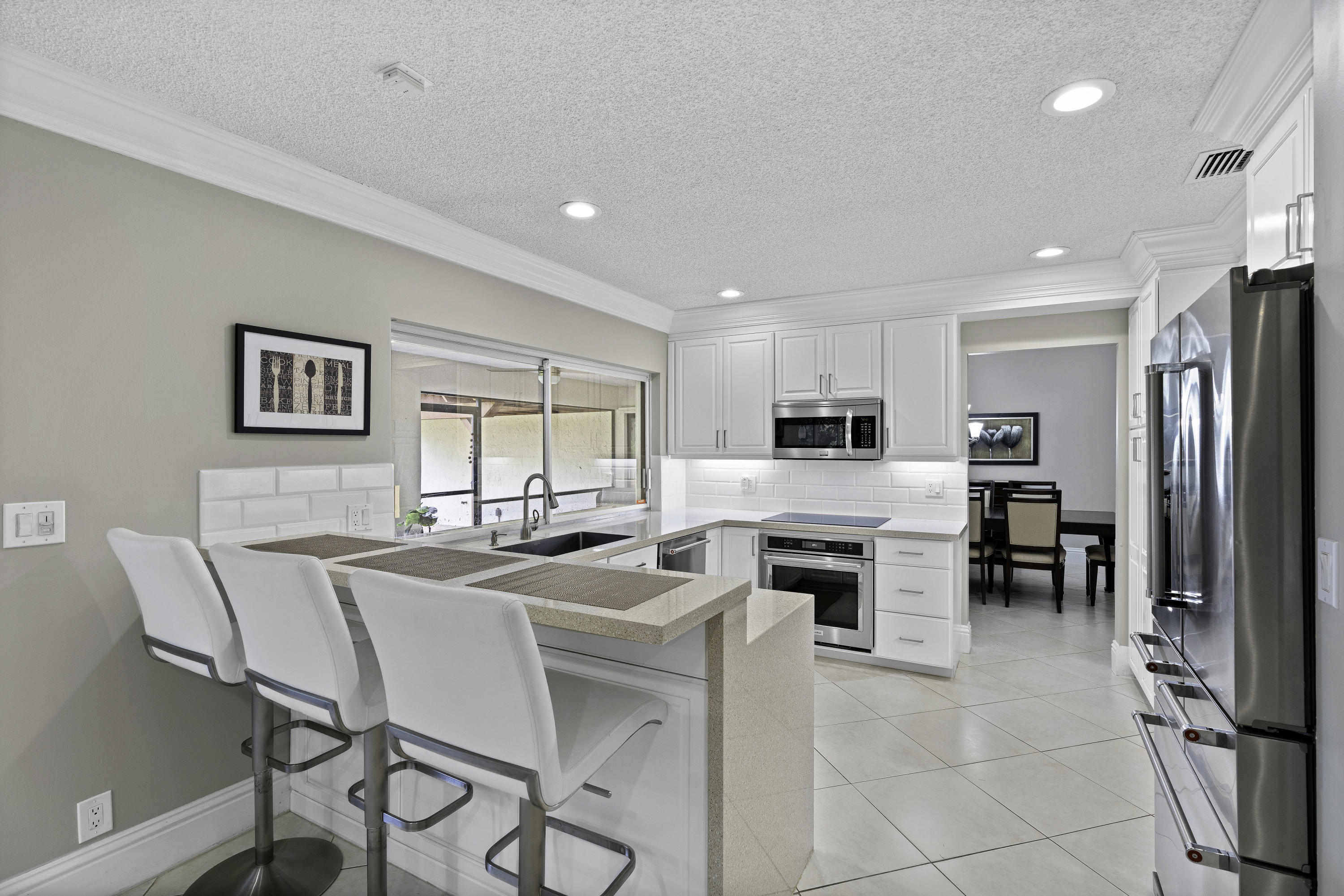 2408 Northwest 26th Street Boca Raton, FL 33431 - Photo 3 of 37 Kitchen Bar