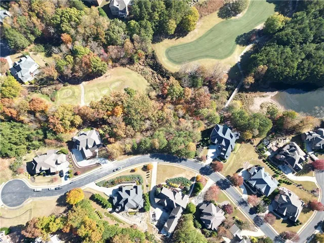 a view of swimming pool with a yard