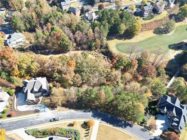 a view of swimming pool and mountain in the background
