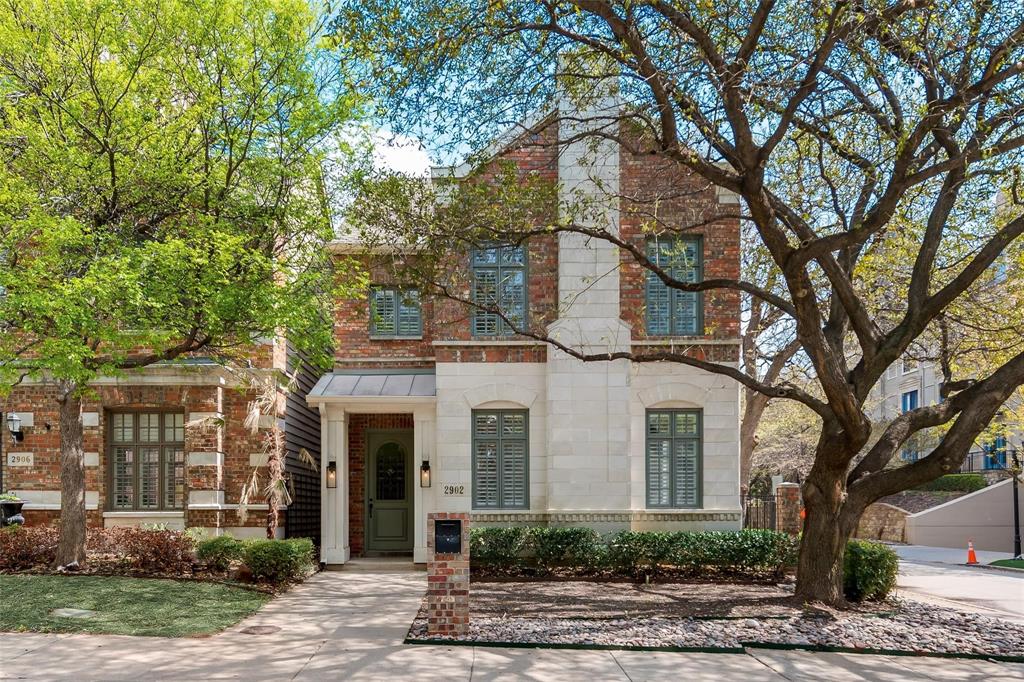 View of front of house featuring brick siding