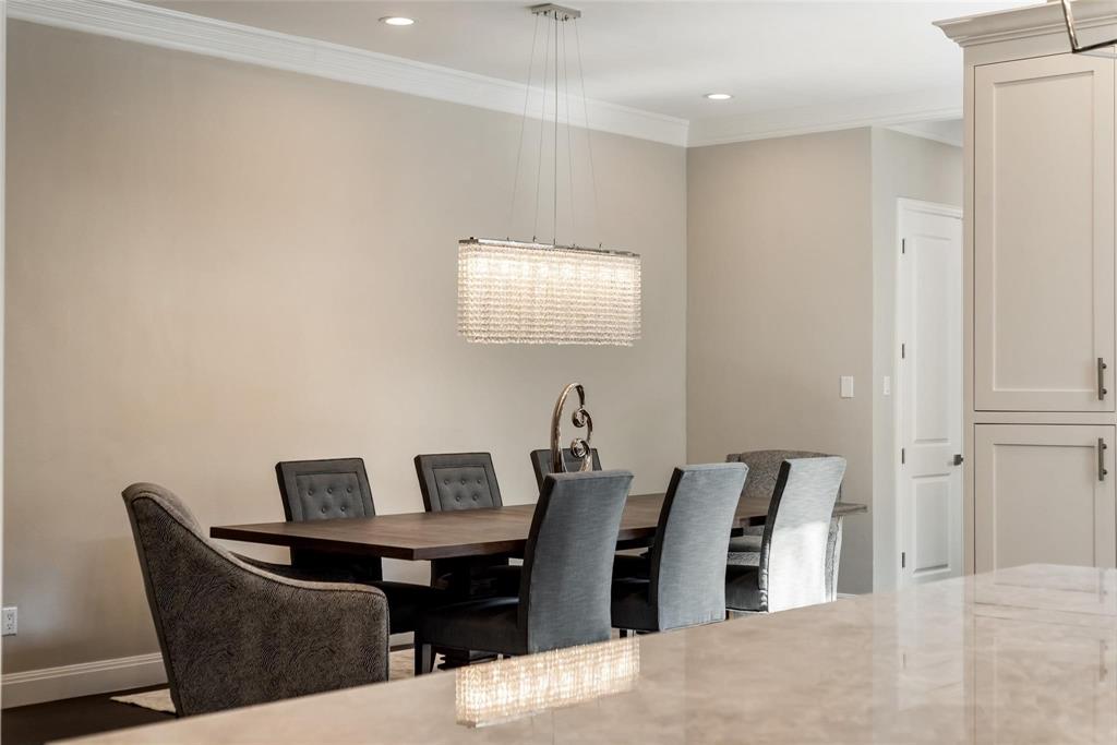2902 North Pearl Street Dallas, TX 75201 - Photo 19 of 36 Dining room featuring ornamental molding, baseboards, and recessed lighting