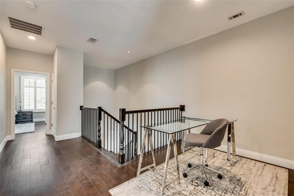 2902 North Pearl Street Dallas, TX 75201 - Photo 20 of 36 Home office featuring dark wood-style floors, baseboards, and visible vents