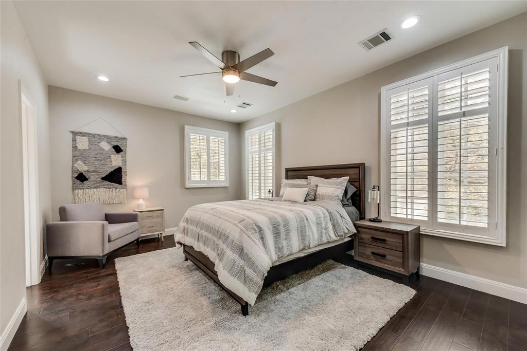 2902 North Pearl Street Dallas, TX 75201 - Photo 21 of 36 Bedroom featuring dark wood-style flooring, baseboards, and visible vents
