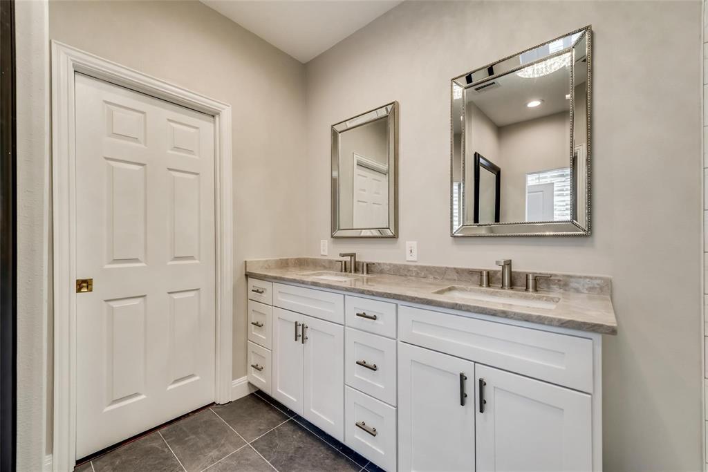 2902 North Pearl Street Dallas, TX 75201 - Photo 34 of 36 Bathroom featuring double vanity, a sink, and tile patterned flooring