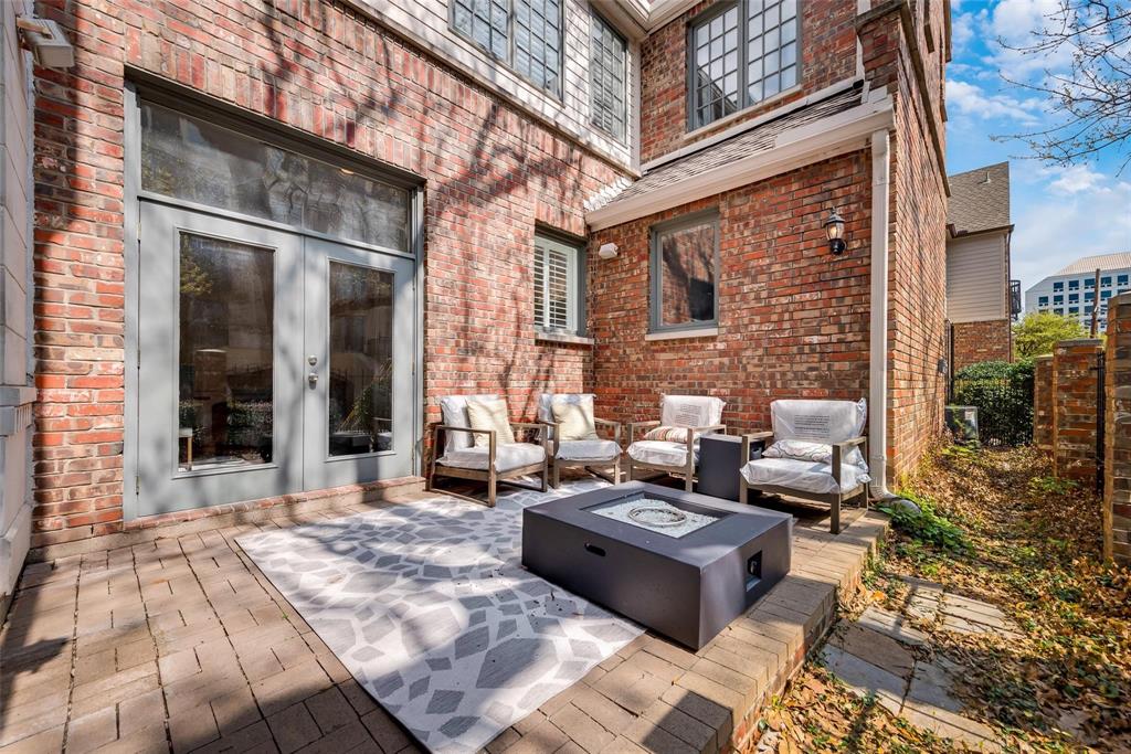 2902 North Pearl Street Dallas, TX 75201 - Photo 8 of 36 View of patio / terrace featuring an outdoor fire pit and french doors