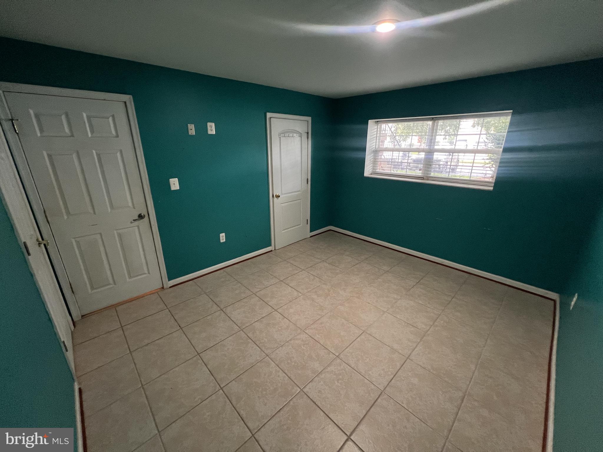 8871 Dunstable Loop Bristow, VA 20136 - Photo 6 of 10 a view of empty room with window