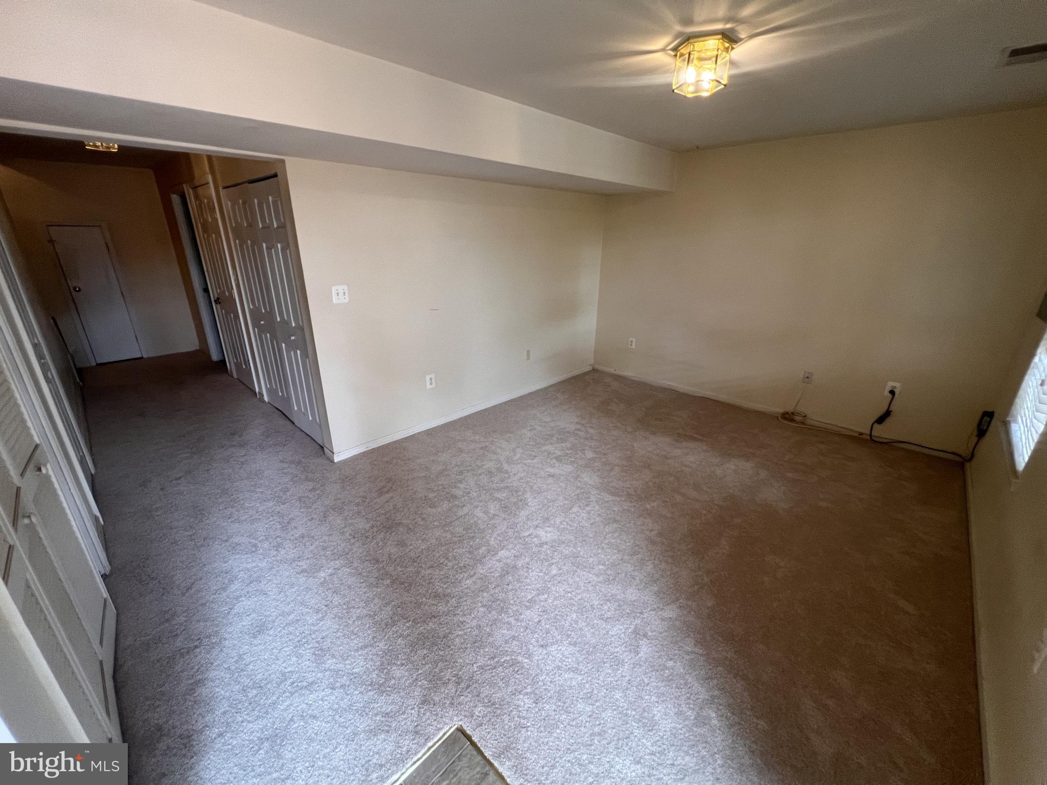 8871 Dunstable Loop Bristow, VA 20136 - Photo 8 of 10 wooden floor in an empty room