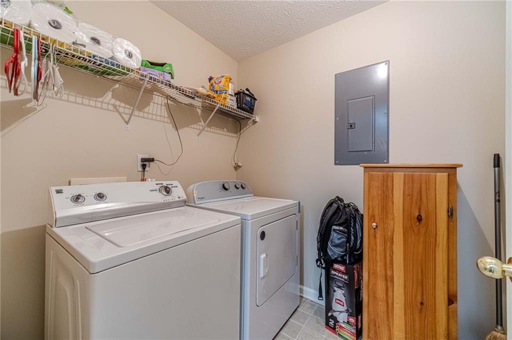 309 Magnolia Lane Monroe, GA 30655 - Photo 18 of 25 a utility room with dryer and washer