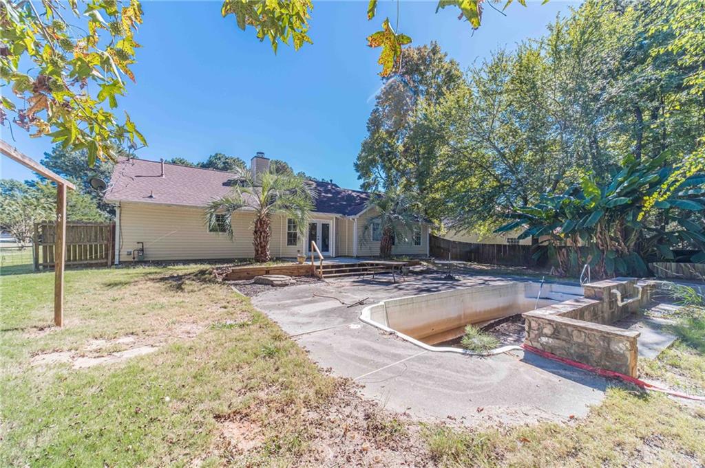 309 Magnolia Lane Monroe, GA 30655 - Photo 24 of 25 a view of a house with backyard